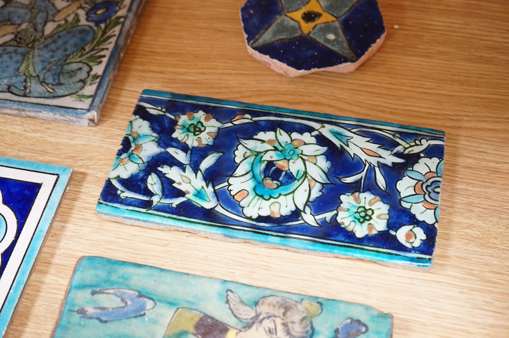 Six various Iznik and Islamic tiles, largest 25 x 22cm. Condition - fair